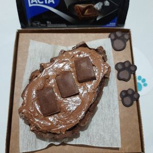 imagem do produto Ovo de colher 250gr coberto com chocolate ao leite, cravejado com Diamante Negro