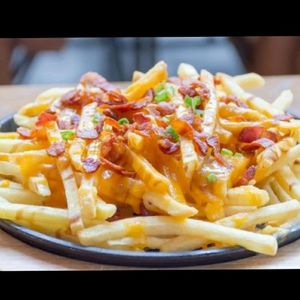 imagem do produto Batata frita cheddar e bacon (Média)