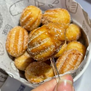 imagem do produto 25 MINI CHURROS  (doce de leite e chocolate)
