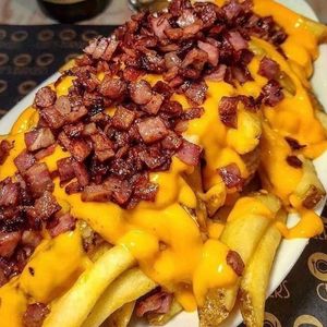 imagem do produto Porção de batatas fritas com cheddar e bacon 