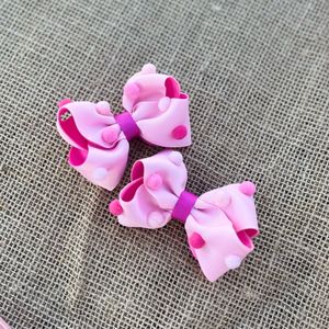 imagem do produto Duplinha de laços pompons rosa tamanho m