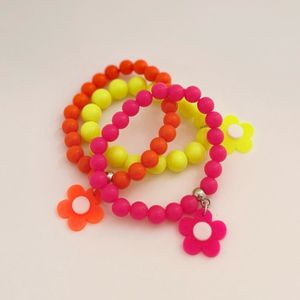 imagem do produto Trio pulseiras flores neon 