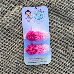 imagem do produto Hair clip tons de rosa pompons 