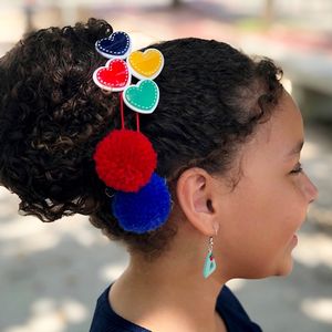 imagem do produto Hair clip pompom três corações 