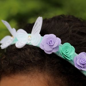 imagem do produto Tiara mundo borboleta e flores 
