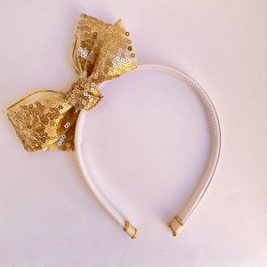 imagem do produto Tiara brilho dourado 