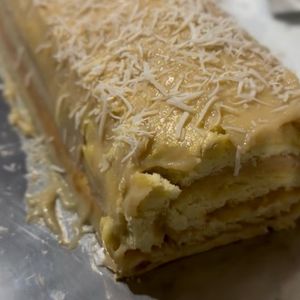 imagem do produto Rocambole de doce de leite com coco fatia 