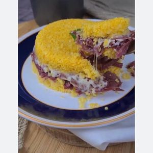 imagem do produto Cuscuz Com Charque E Mussarela 