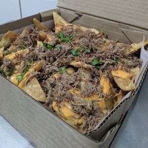 imagem do produto Tortilhas com cheddar e Carne de sol