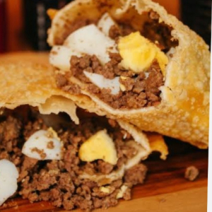 imagem do produto Pastel de carne moída com ovo cozido