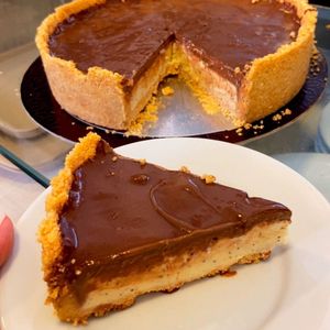 imagem do produto Cheesecake de maracujá com chocolate fatia 