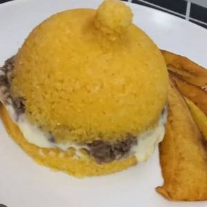 imagem do produto Cuscuz recheado com Carne seca,banana frita e queijo.