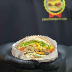 imagem do produto X acebolado + coca lata 