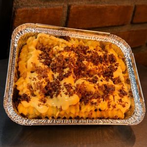 imagem do produto Batata frita com cheddar cremoso (produçao caseira) e bacon 