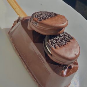 imagem do produto Paleta de oreo no chocolate ao leite preto 