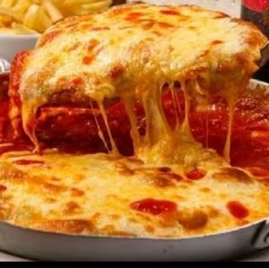 imagem do produto À parmegiana para duas à três pessoas ( carne)