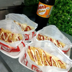 imagem do produto Combo Calabresa 4 Hot Dog + Xereta 2 Litros
