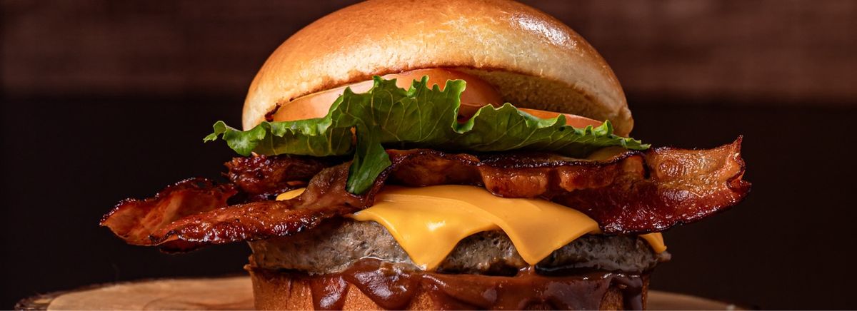 Ótimu’s Burguer  logo