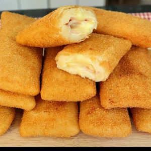 imagem do produto ENROLADINHO PRESUNTO E MUSSARELA 