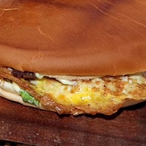 imagem do produto Xis bacon com cheddar 18cm prensado