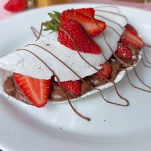 imagem do produto **Ninho, Nutella e Morango 