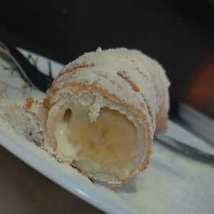 imagem do produto Enroladinho de banana com creme de ninho e leite em pó 