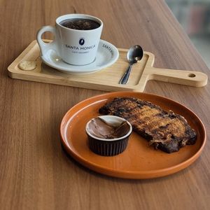 imagem do produto COMBO TPM; CHOCOLATE QUENTE 180ml + CHOCOLOMBA BAUDUCCO + NUTELLA