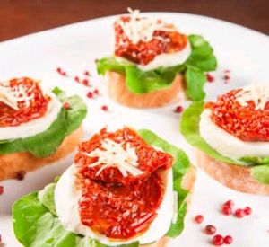 imagem do produto 1 Brusqueta Rucula Com Tomate Seco