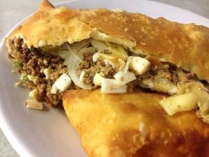 imagem do produto Pastel Grande de Carne, Palmito e Ovo