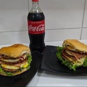 imagem do produto 2 X-Tudo com 2 Bife + Coca Cola 1l ou Guaraná 1l