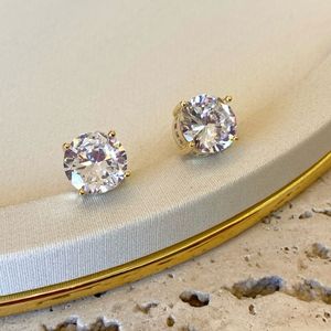 imagem do produto Brinco Ponto de Luz G Lateral Craveiado