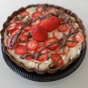 imagem do produto Ninho com Brigadeiro e Morango - Bombom Aberto