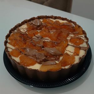 imagem do produto Abacaxi Caramelizado com Coco em Flocos e Ninho - Bombom Aberto 