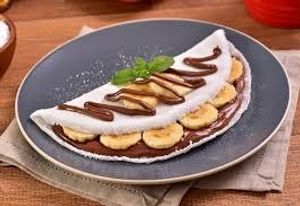 imagem do produto DOCE ENCANTO Tapioca c/ banana, e (leite moça, Nutella ou doce de leite)