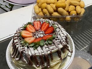 imagem do produto Bolo Ninho morango e Nutella+50 salgados variados