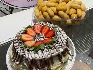 imagem do produto Bolo Ninho morangos e Nutella + 100 salgados