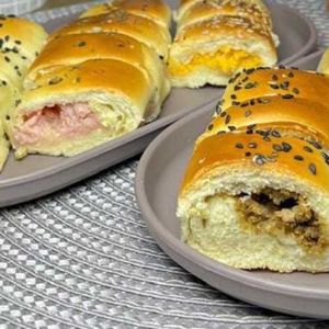 imagem do produto Meio Cento de salgado assado sabores. Presunto e queijo carne e frango