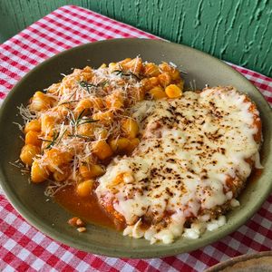 imagem do produto Parmegiana de mignon com Nhoque ao sugo ou bechamel 