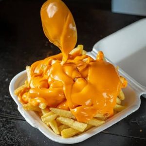 imagem do produto Batata palito com cheddar cremoso.