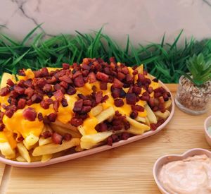 imagem do produto Porções de Batata com Bacon/cheddar (M)