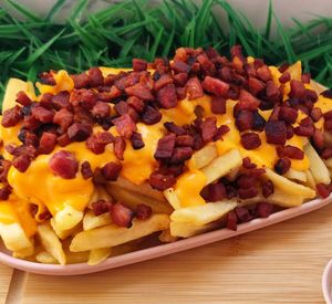 imagem do produto Porções de Batata com Bacon/cheddar (G)