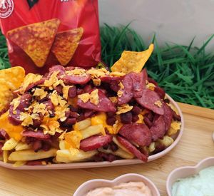 imagem do produto Porção de Batata com cheddar/Bacon, Calabresa e farofa de Doritos (P)