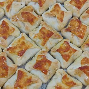 imagem do produto Mini trouxinha de ricota com tomate seco un