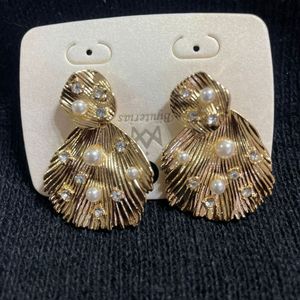 imagem do produto BRINCO CONCHA CADA