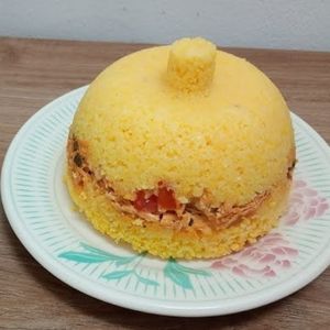 imagem do produto Cuscuz recheado de calabresa com vinagrete, cheddar, catupiry e azeitona.