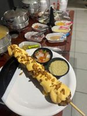 imagem do produto Fraldinha com cheddar e alho frito