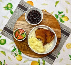 imagem do produto Marmita - Bisteca Milanesa & Purê de Batata + Coca-Cola Grátis