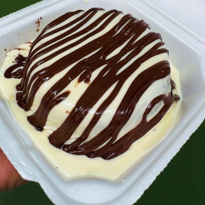 imagem do produto CAKE VULCÃO - CREME DE NINHO E NUTELLA 