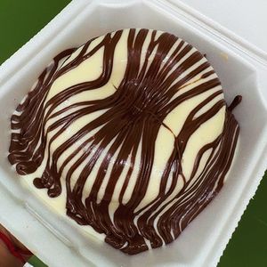 imagem do produto CAKE VULCÃO - CREME DE NINHO COM NUTELLA 