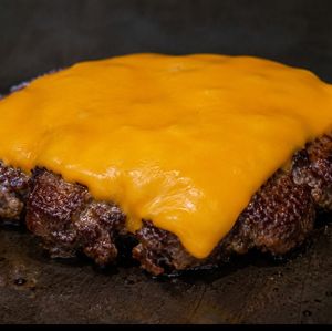 imagem do produto Adicional de Hamburguer com Cheddar  (ATENÇAO: especificar em qual lanche será o adicional)